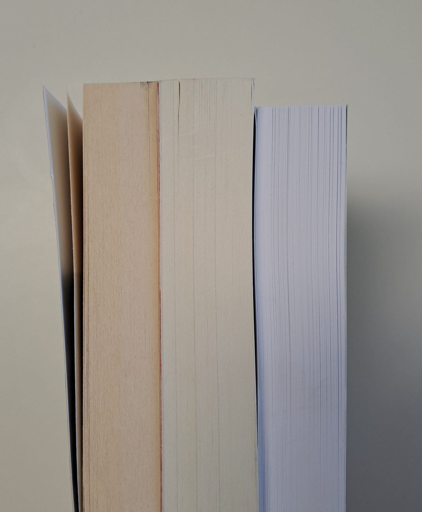 Groundwood, cream, and white paper comparison